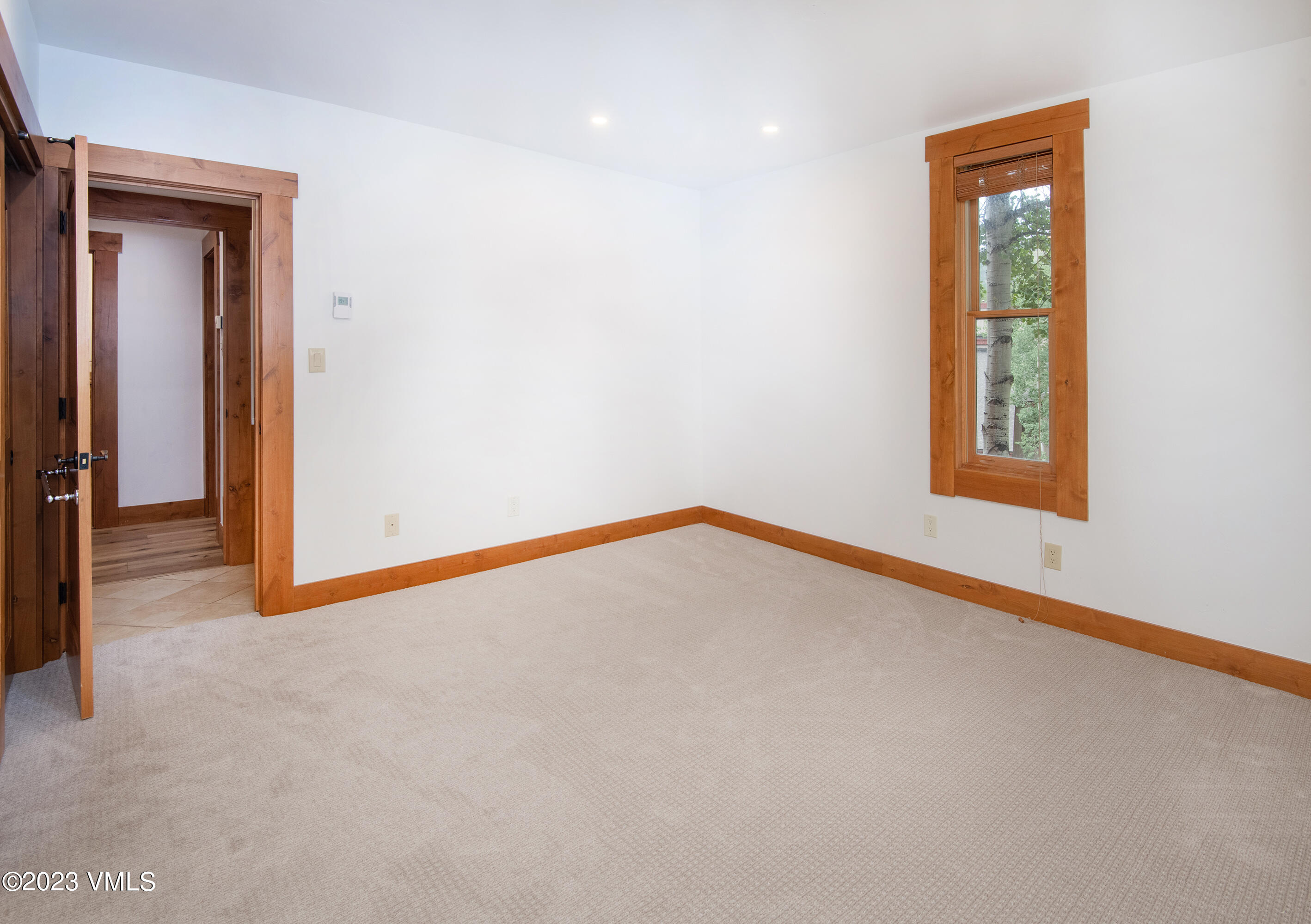3094 Booth Falls Road, Unit 17 Vail, CO 81657 - Photo 16 of 27 a view of an empty room and window