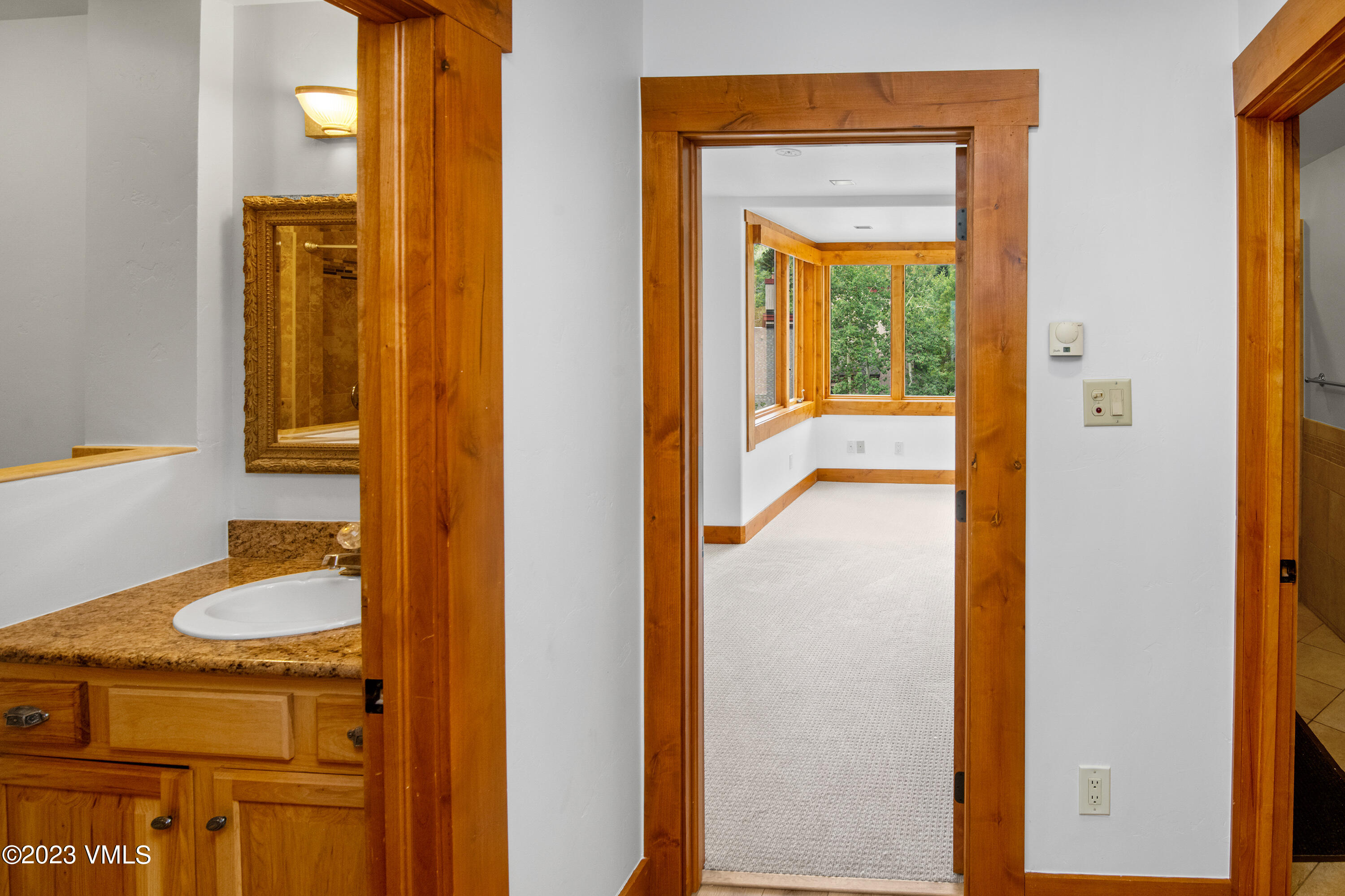3094 Booth Falls Road, Unit 17 Vail, CO 81657 - Photo 17 of 27 a view of a bathroom from a hallway