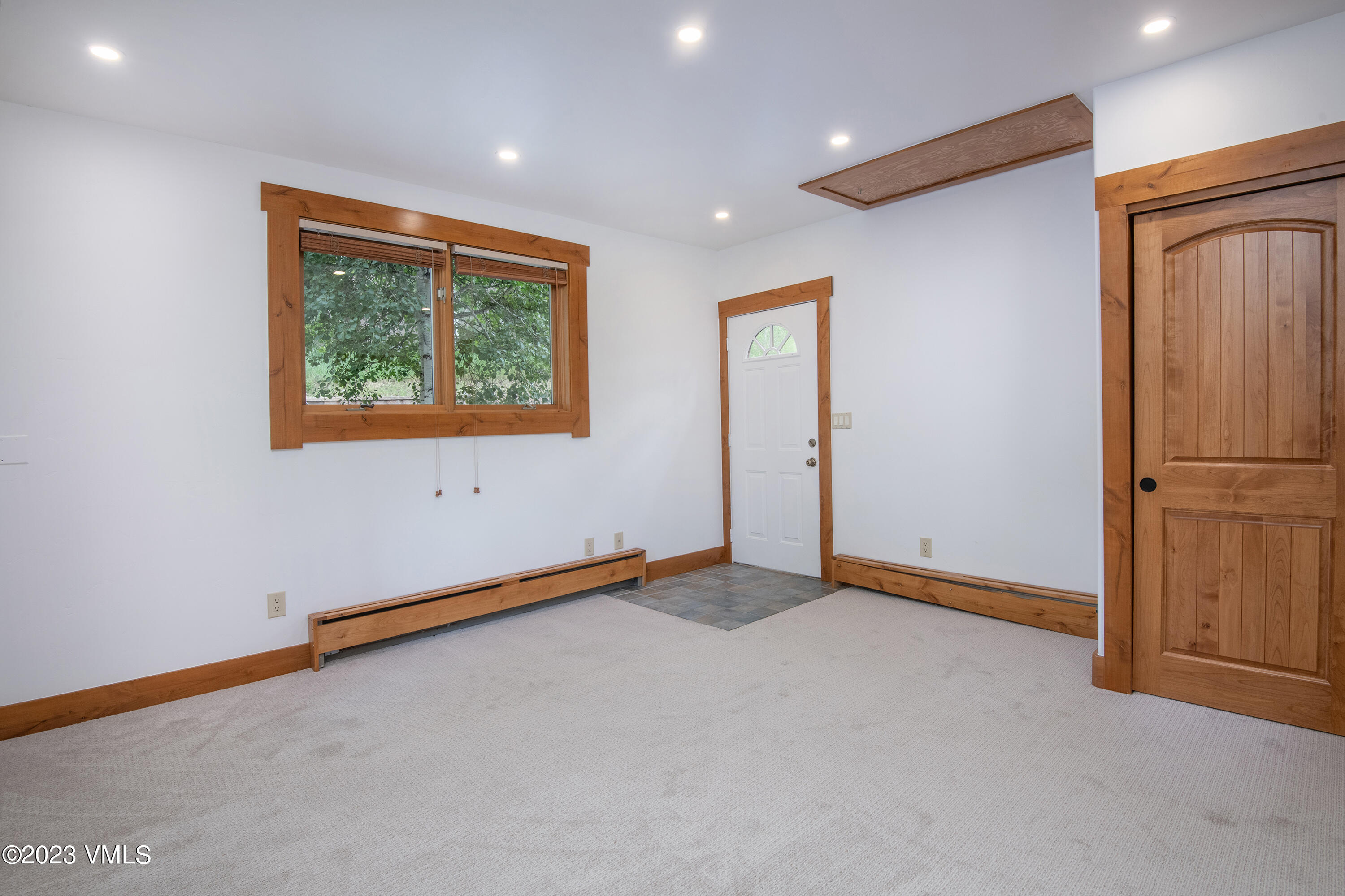 3094 Booth Falls Road, Unit 17 Vail, CO 81657 - Photo 21 of 27 a view of an empty room with a window