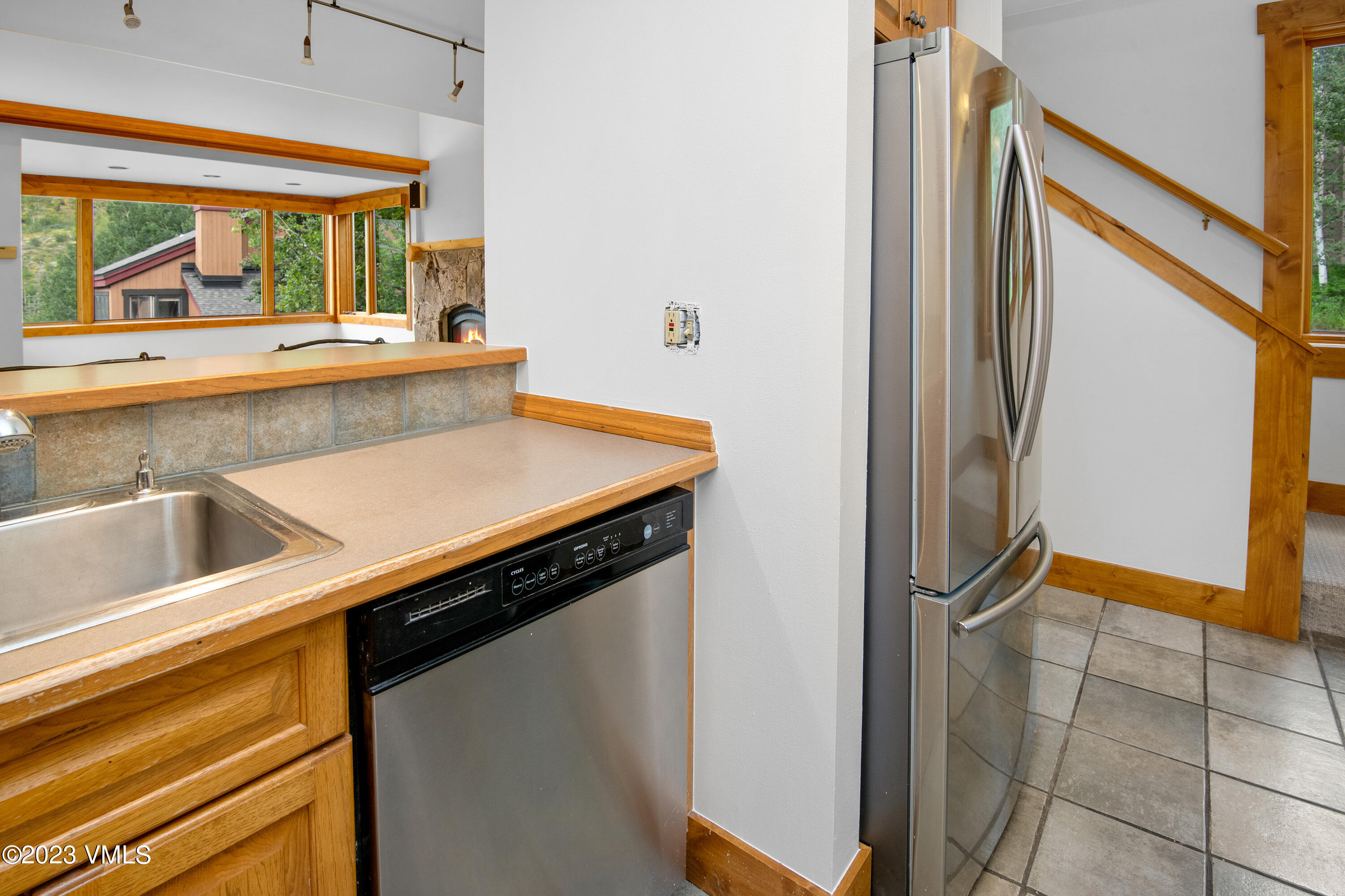 3094 Booth Falls Road, Unit 17 Vail, CO 81657 - Photo 10 of 27 a view of a kitchen with a sink and a window