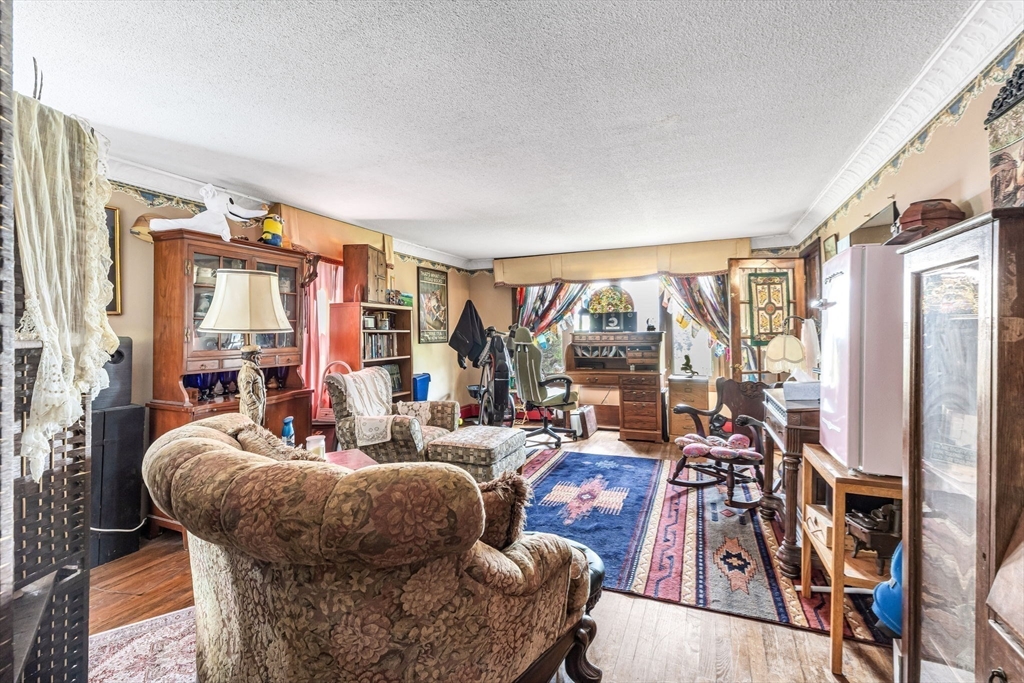 163 South Monson Road Hampden, MA 01036 - Photo 14 of 34 a living room with furniture and a large window