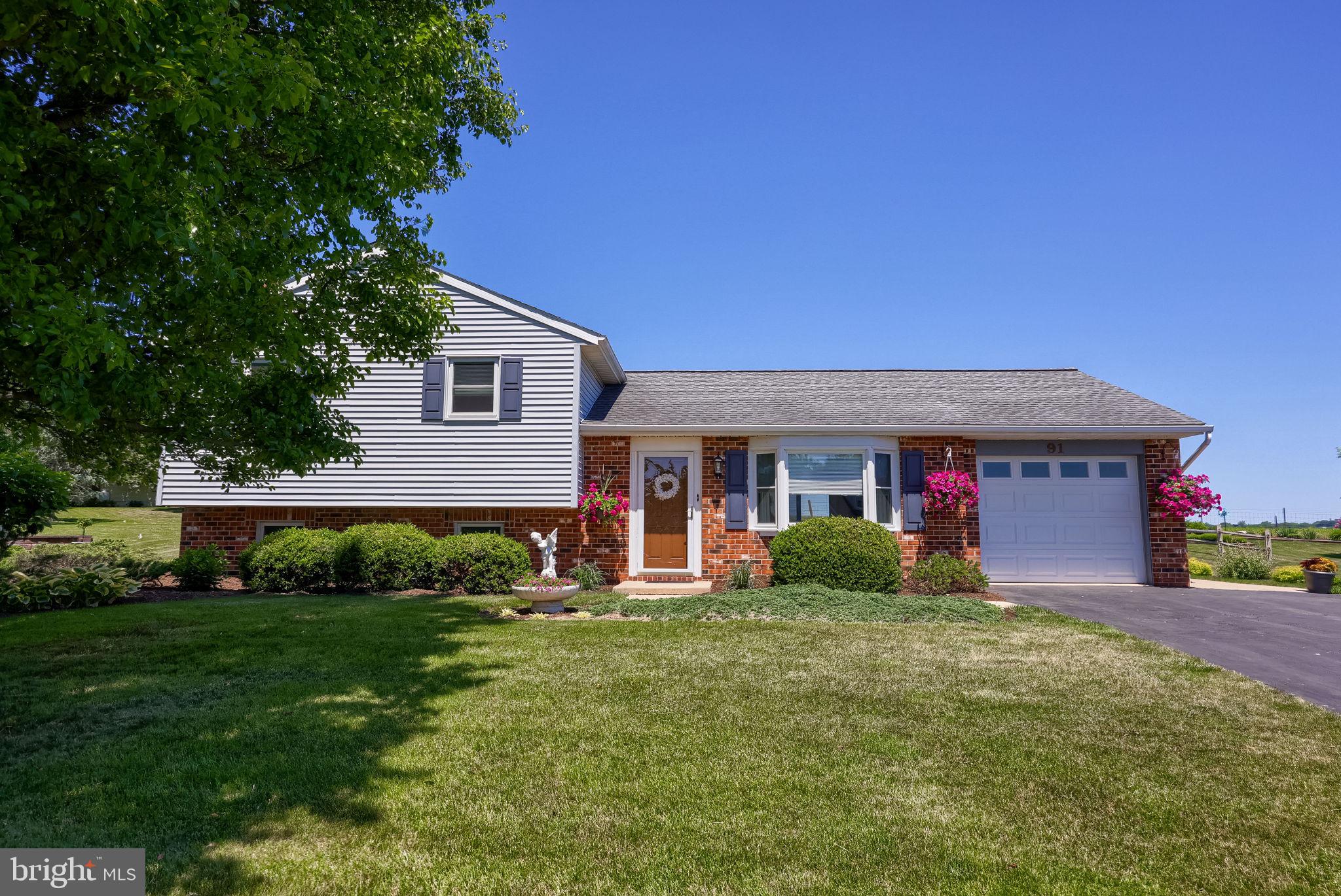 91 Buchland Road Ephrata, PA 17522 - Photo 46 of 59 Charming home with vibrant landscaping.