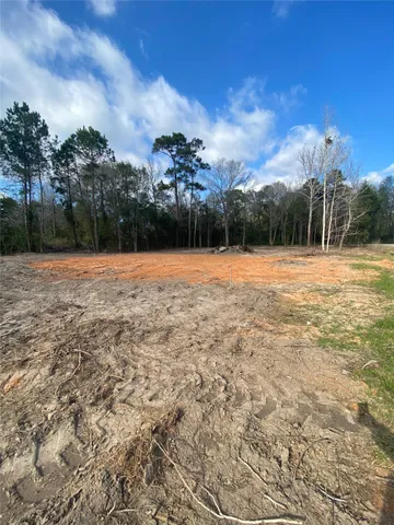 a view of a backyard of the house