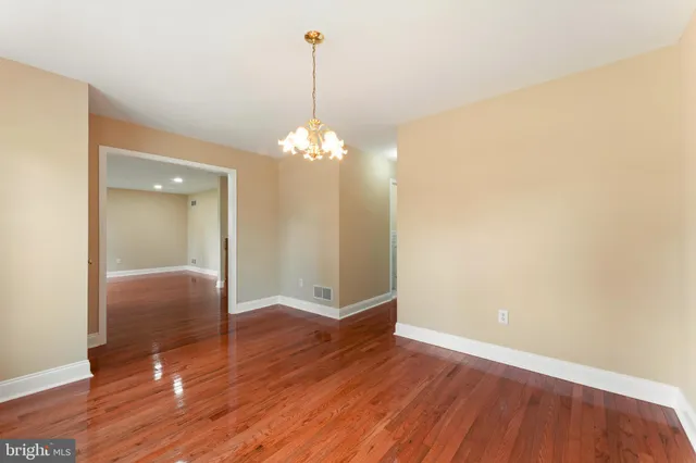 a view of a livingroom with wooden floor