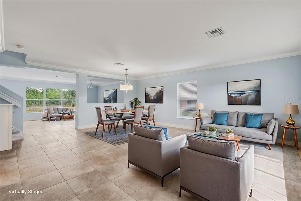 25134 Palisade Road Punta Gorda, FL 33983 - Photo 8 of 58 a living room with furniture and a large window