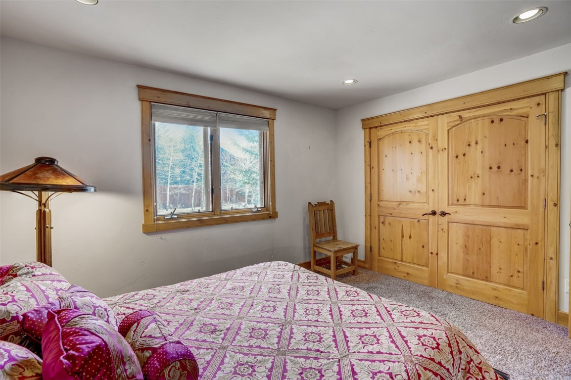 145 Gold Run Circle Dillon, CO 80435 - Photo 31 of 50 a bedroom with a bed and a window