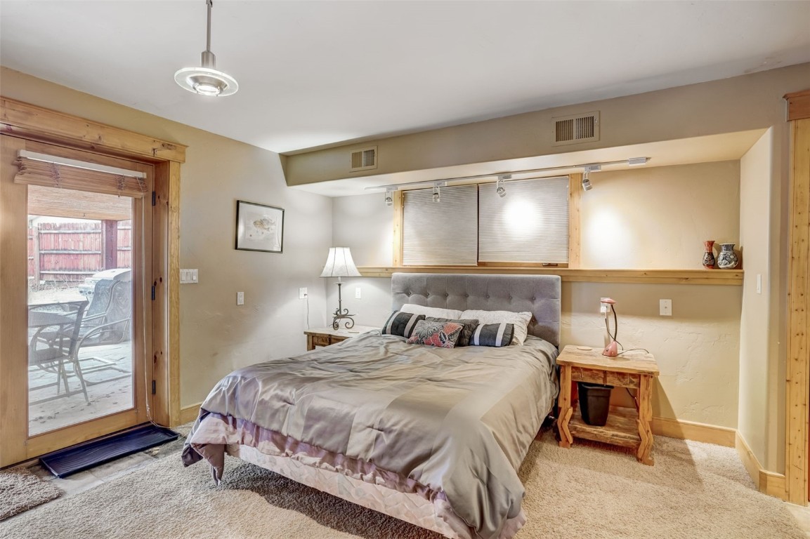 145 Gold Run Circle Dillon, CO 80435 - Photo 39 of 50 a bedroom with a bed and a window