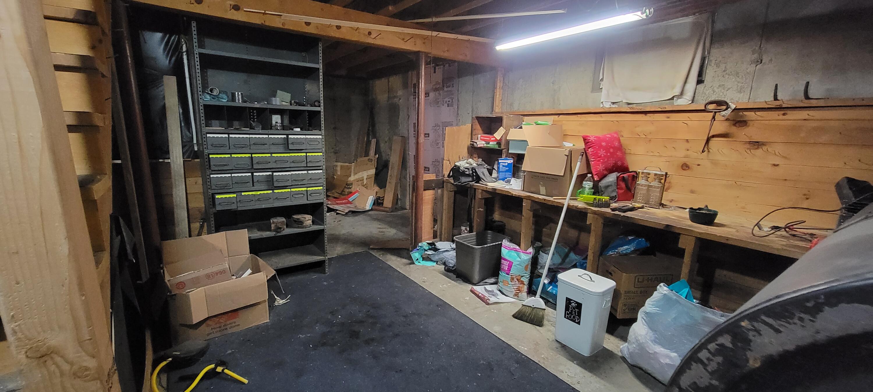 83 Bailey Road Parkman, ME 04443 - Photo 48 of 63 Workbench and Storgae
