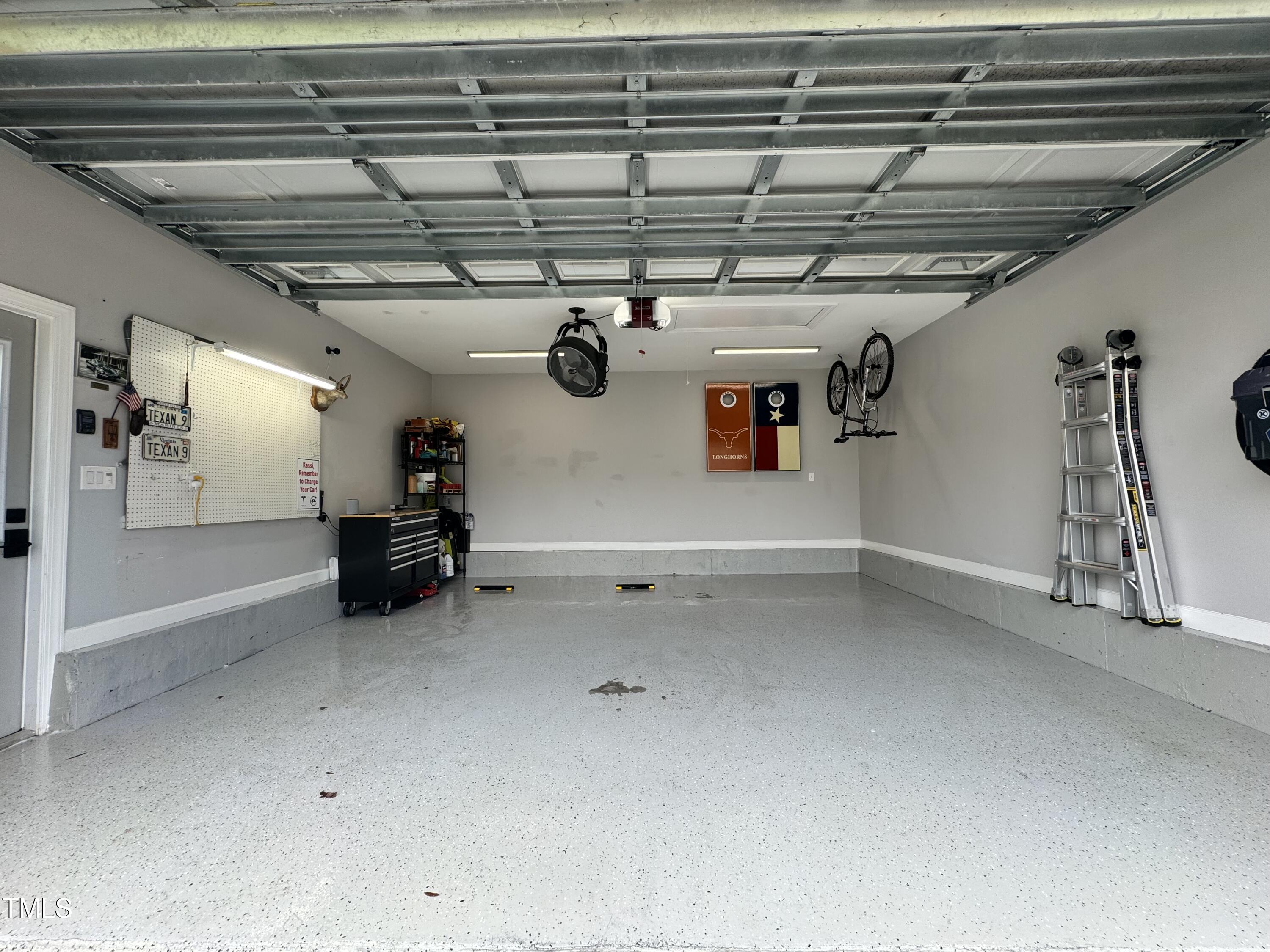 2222 Dunlin Lane Raleigh, NC 27614 - Photo 32 of 35 Garage is not only pristine, but also a tall truck/SUV friendly zone!