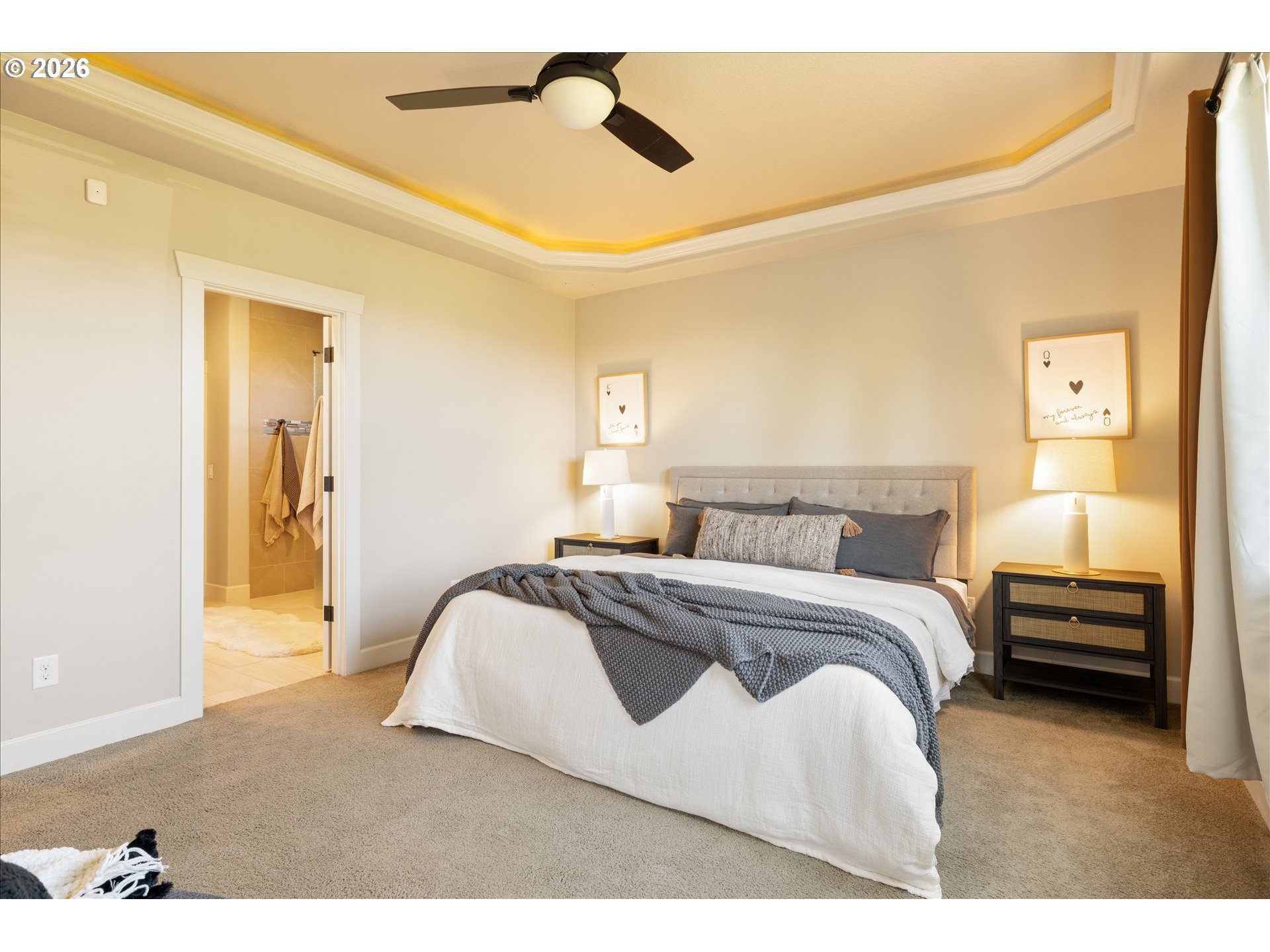 1889 South Harrier Road Ridgefield, WA 98642 - Photo 15 of 29 a bedroom with a bed and a chandelier