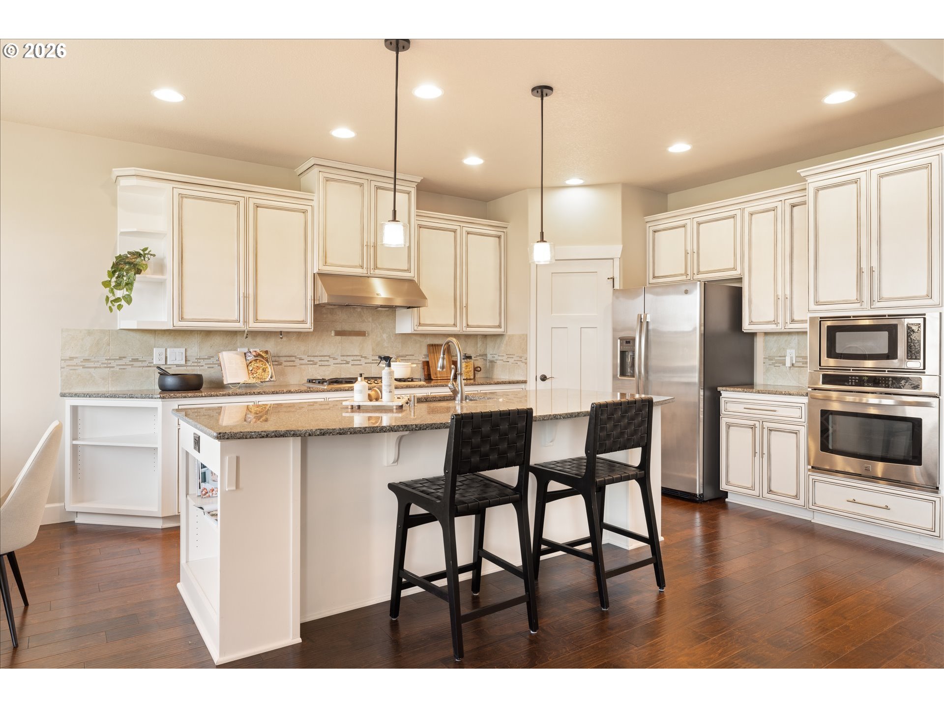 1889 South Harrier Road Ridgefield, WA 98642 - Photo 10 of 29 a kitchen with kitchen island granite countertop a sink cabinets and stainless steel appliances