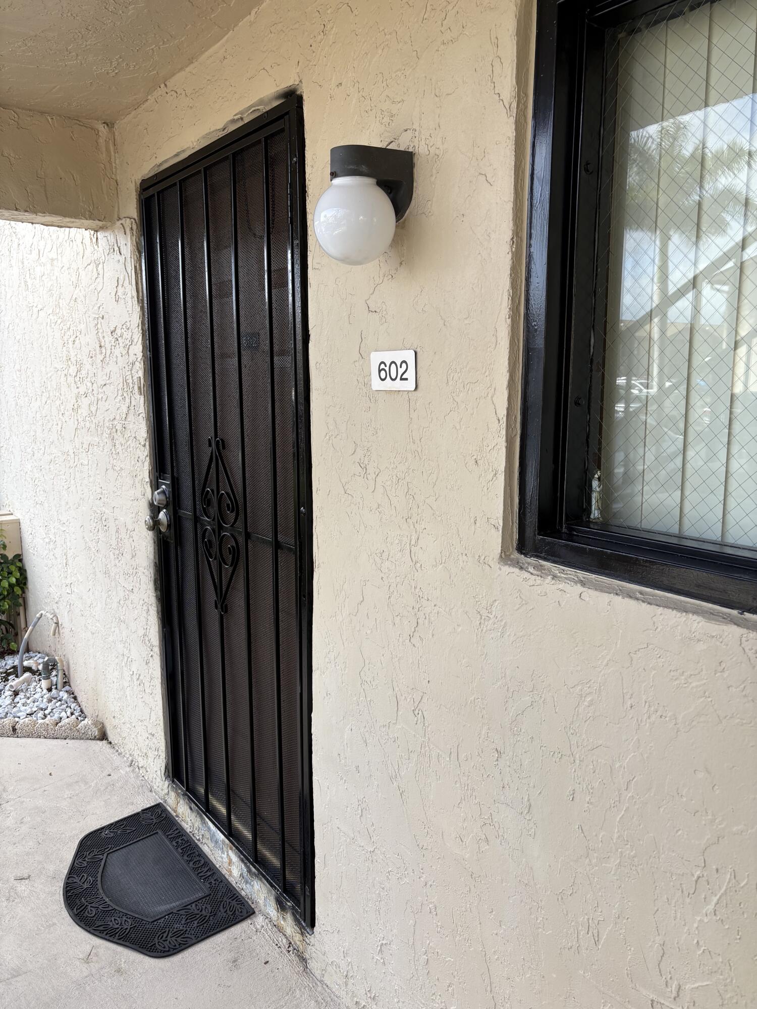 9503 Boca Cove Circle, Unit 602 Boca Raton, FL 33428 - Photo 7 of 24 a view of an entryway