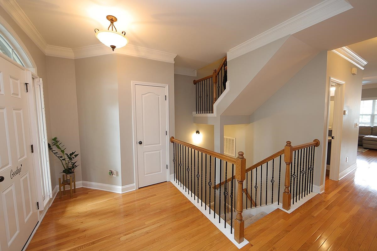 1105 Weston Green Loop Cary, NC 27513 - Photo 2 of 24 a view of a hallway view with staircase