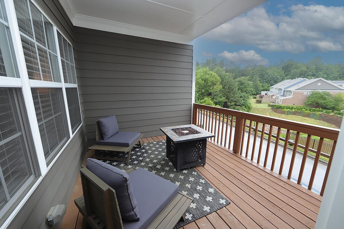 1105 Weston Green Loop Cary, NC 27513 - Photo 22 of 24 a balcony view with a seating space