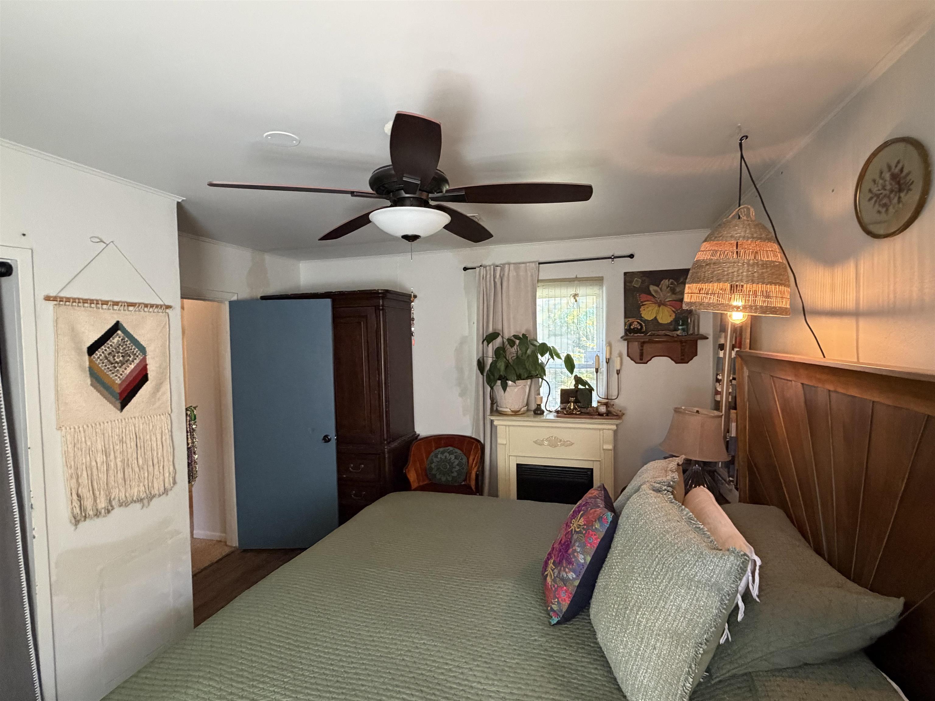 323 Sisco Road Pomona Park, FL 32181 - Photo 30 of 31 a bedroom with a bed and window