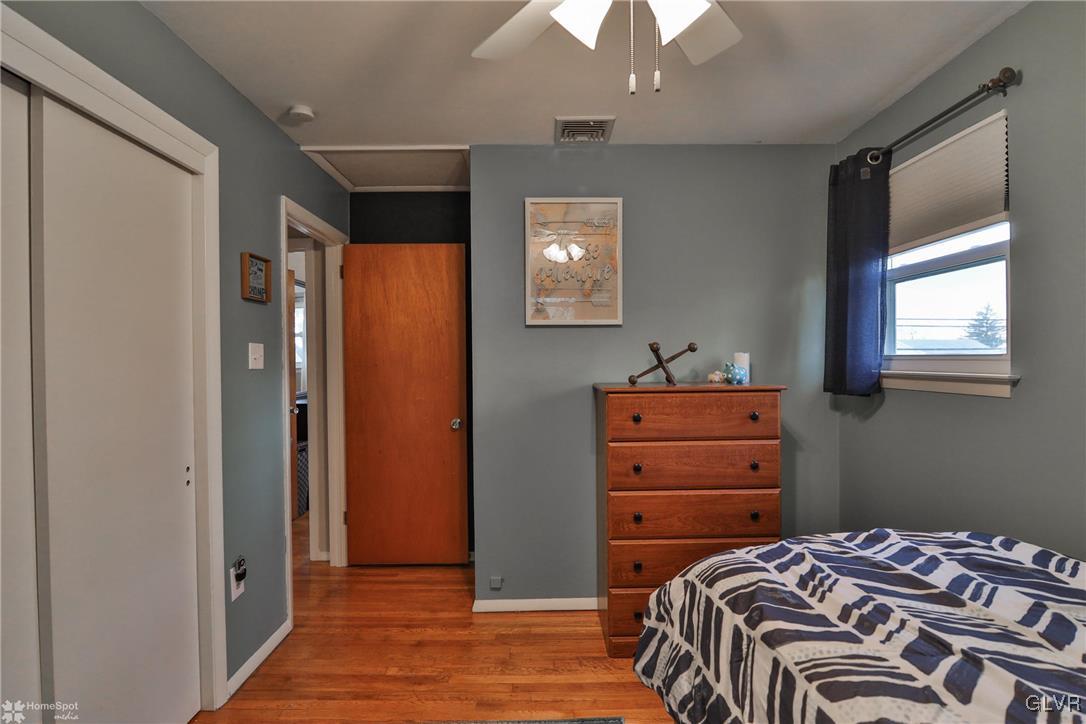 1518 Ralston Road Bethlehem, PA 18018 - Photo 29 of 50 a bedroom with a bed and a dresser in it