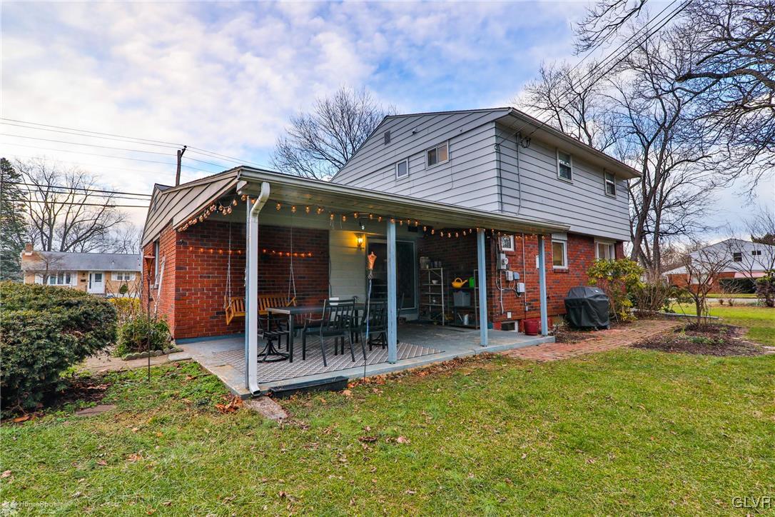 1518 Ralston Road Bethlehem, PA 18018 - Photo 41 of 50 a view of a house with a yard patio and fire pit