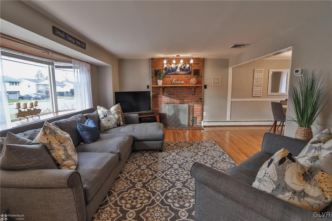 1518 Ralston Road Bethlehem, PA 18018 - Photo 5 of 50 a living room with furniture and a fireplace