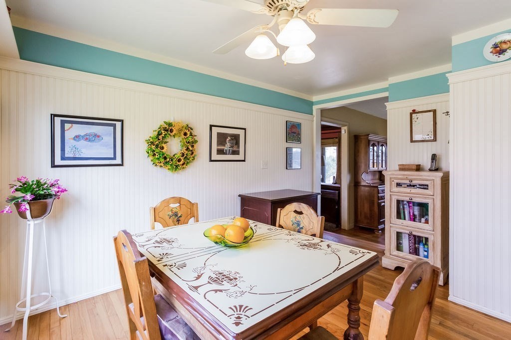 181 Newton Road Springfield, MA 01118 - Photo 8 of 24 a view of a dining room with furniture and wooden floor
