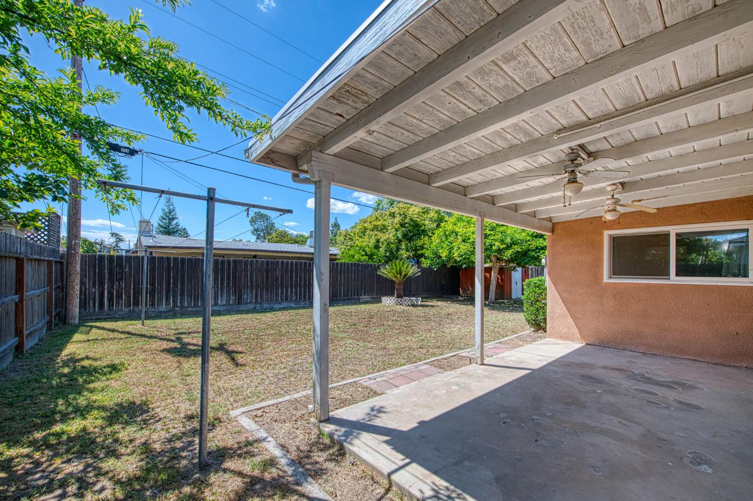 148 Russell Avenue Clovis, CA 93612 - Photo 27 of 33 a house view with a backyard space
