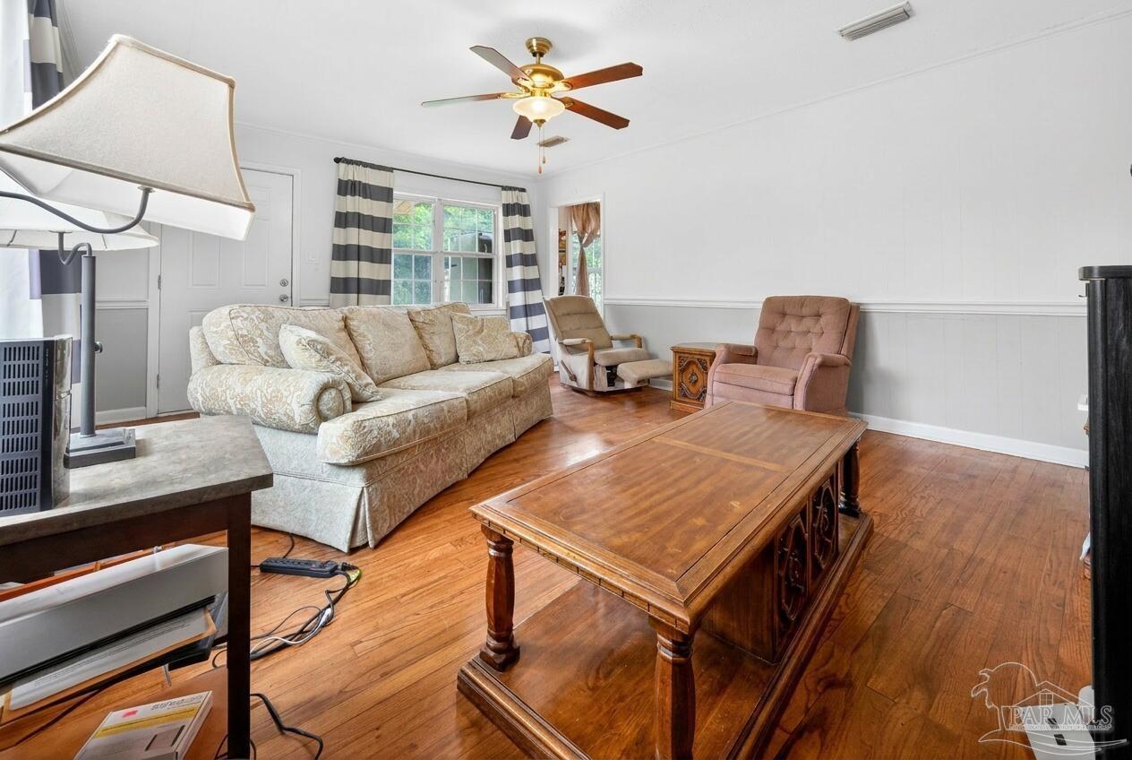6253 Allentown Road Milton, FL 32570 - Photo 17 of 31 a living room with furniture