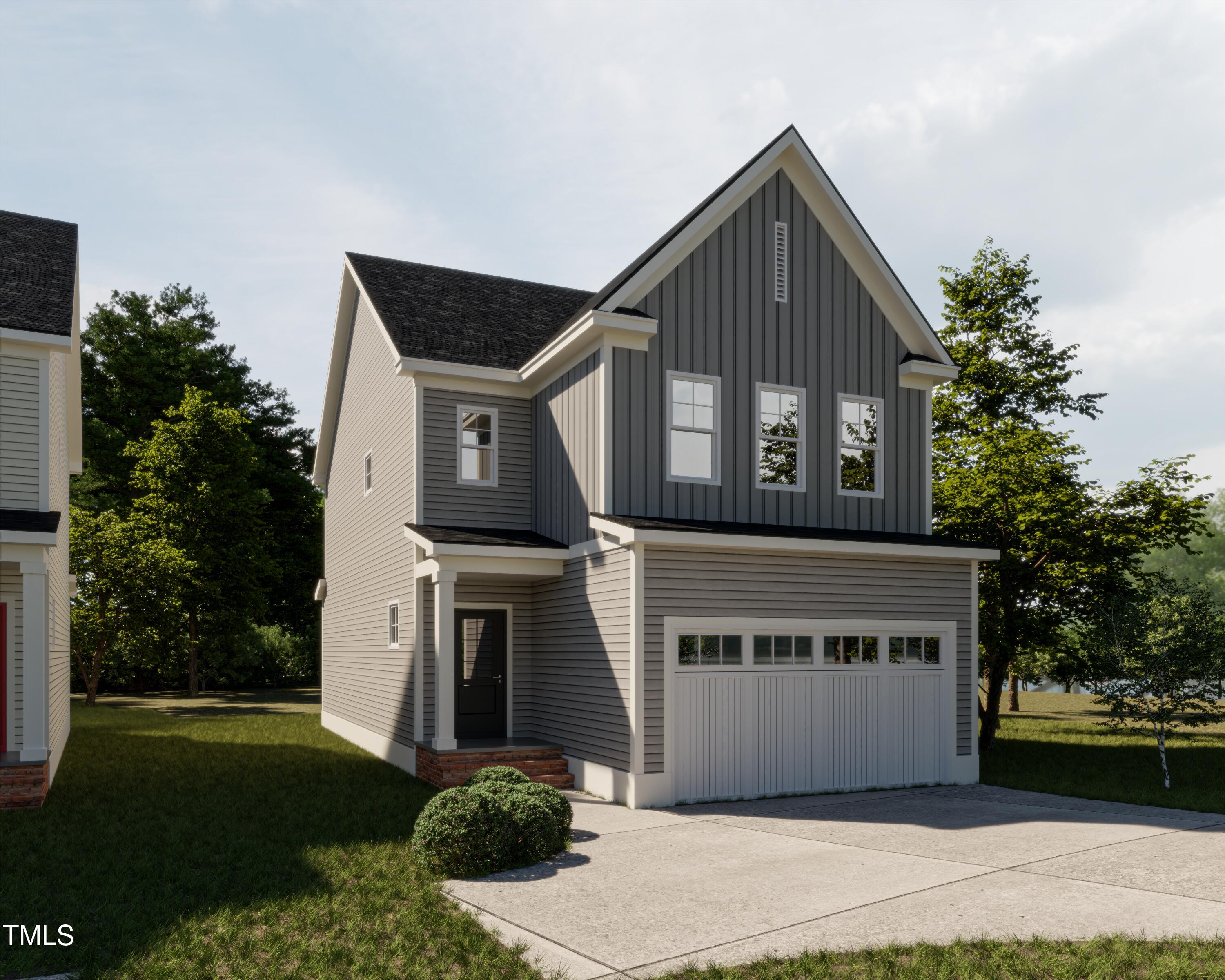 1008 Harper Road Raleigh, NC 27603 - Photo 1 of 21 a front view of a house with a garden