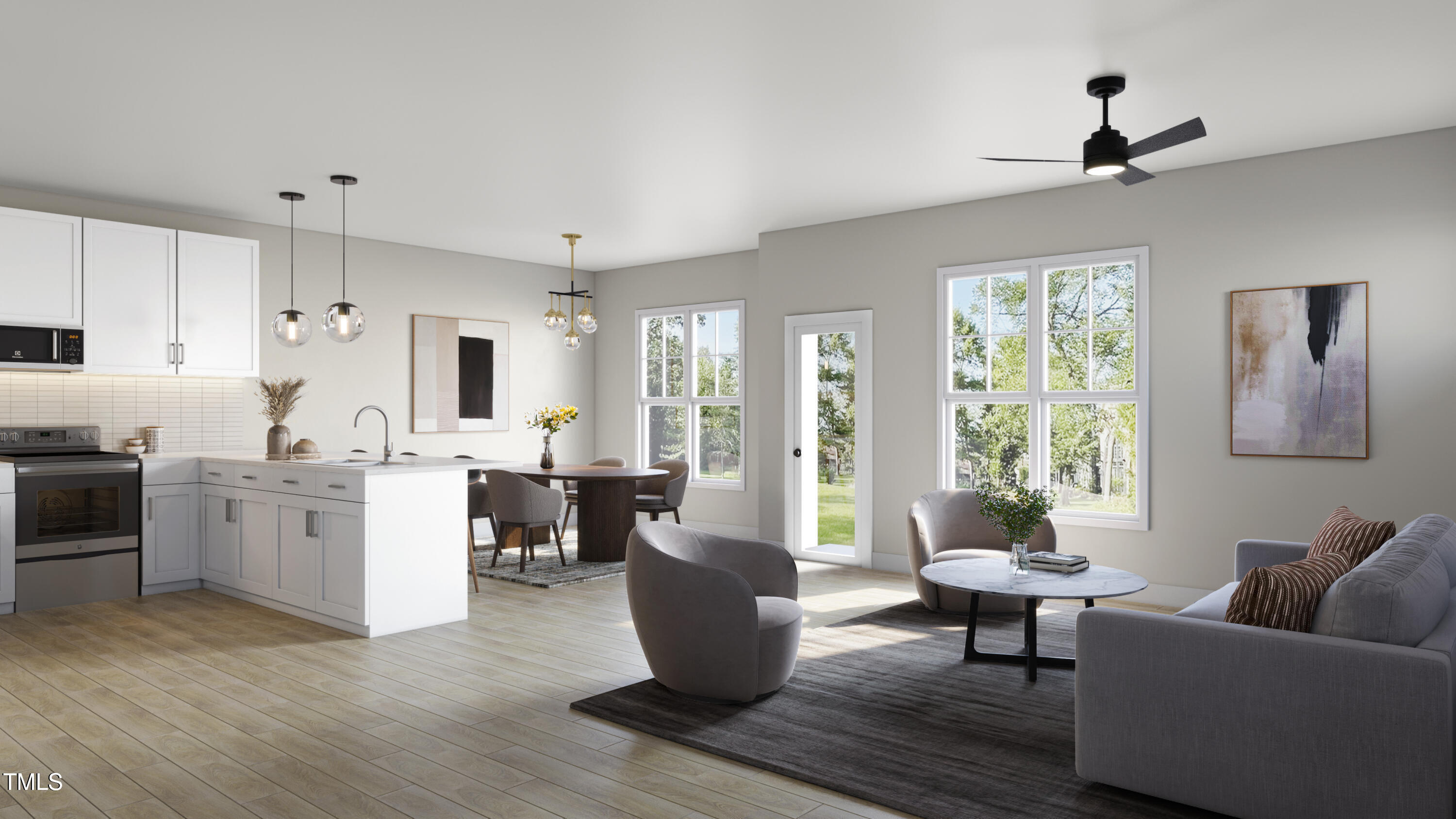 1008 Harper Road Raleigh, NC 27603 - Photo 4 of 21 a living room with furniture and a kitchen area