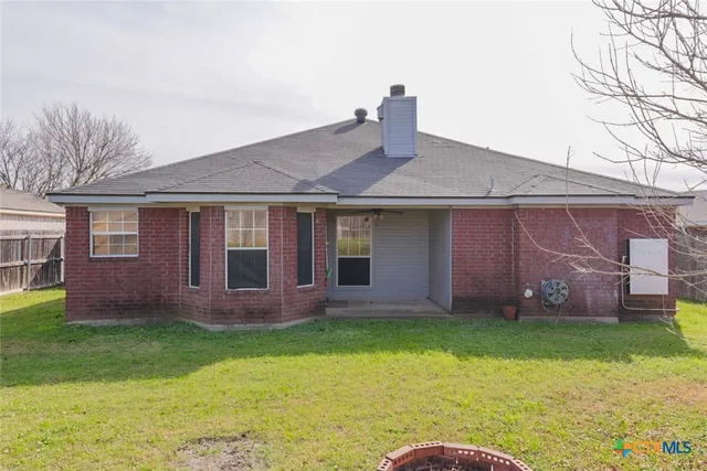 a house view with a garden space