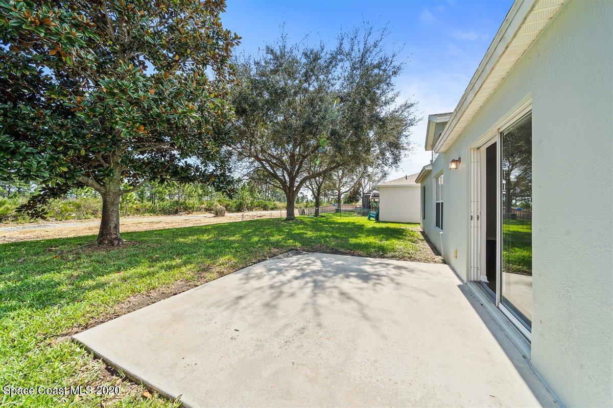 1002 Brumpton Place Rockledge, FL 32955 - Photo 20 of 26 Rear Patio