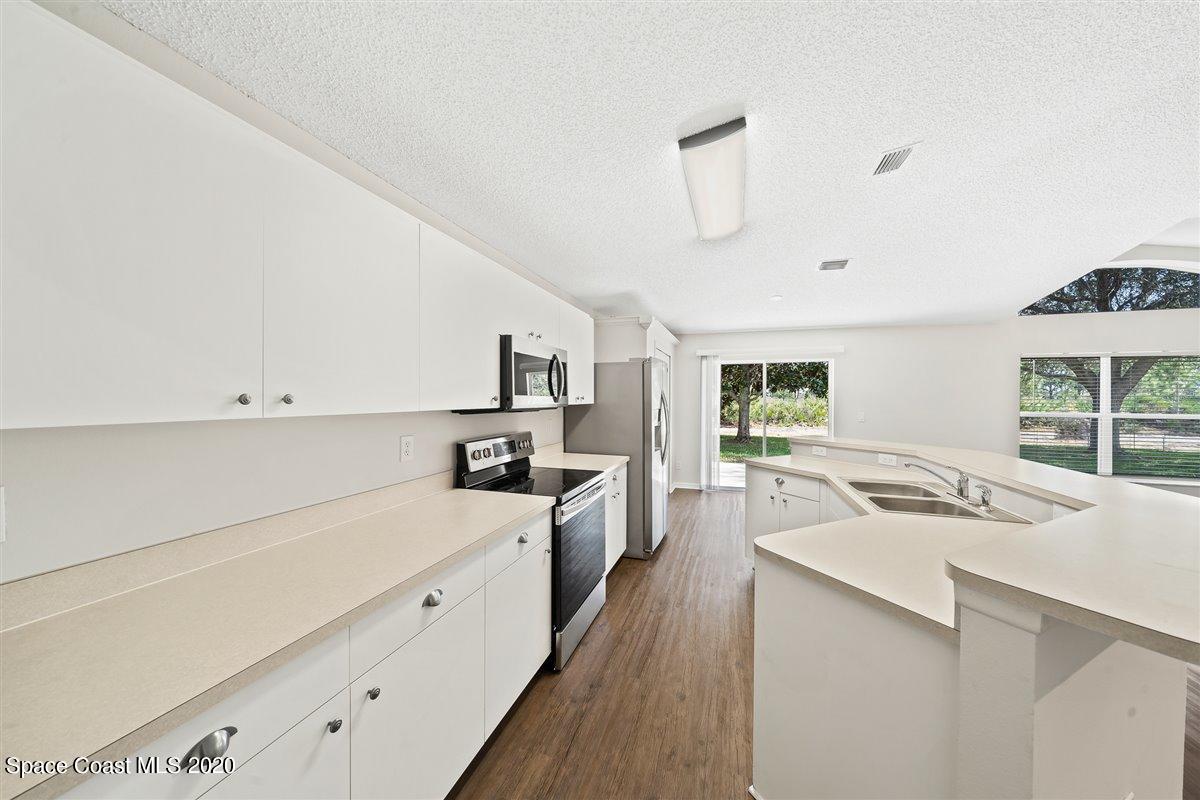 1002 Brumpton Place Rockledge, FL 32955 - Photo 8 of 26 Kitchen