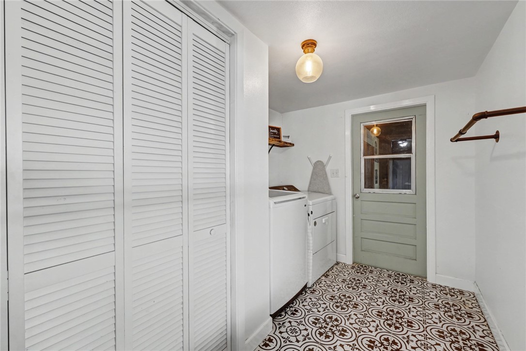 708 East Main Street Sinton, TX 78387 - Photo 16 of 28 a room with a walk in closet and wooden floor