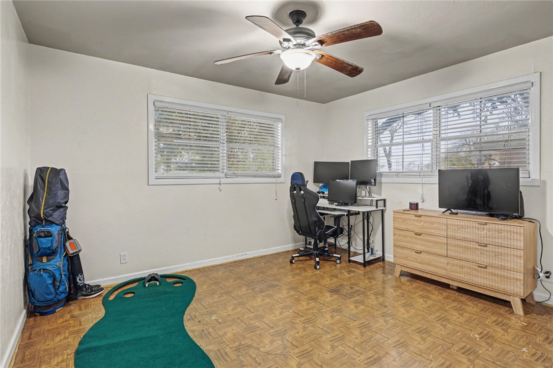 708 East Main Street Sinton, TX 78387 - Photo 18 of 28 a view of a workspace with furniture and a window