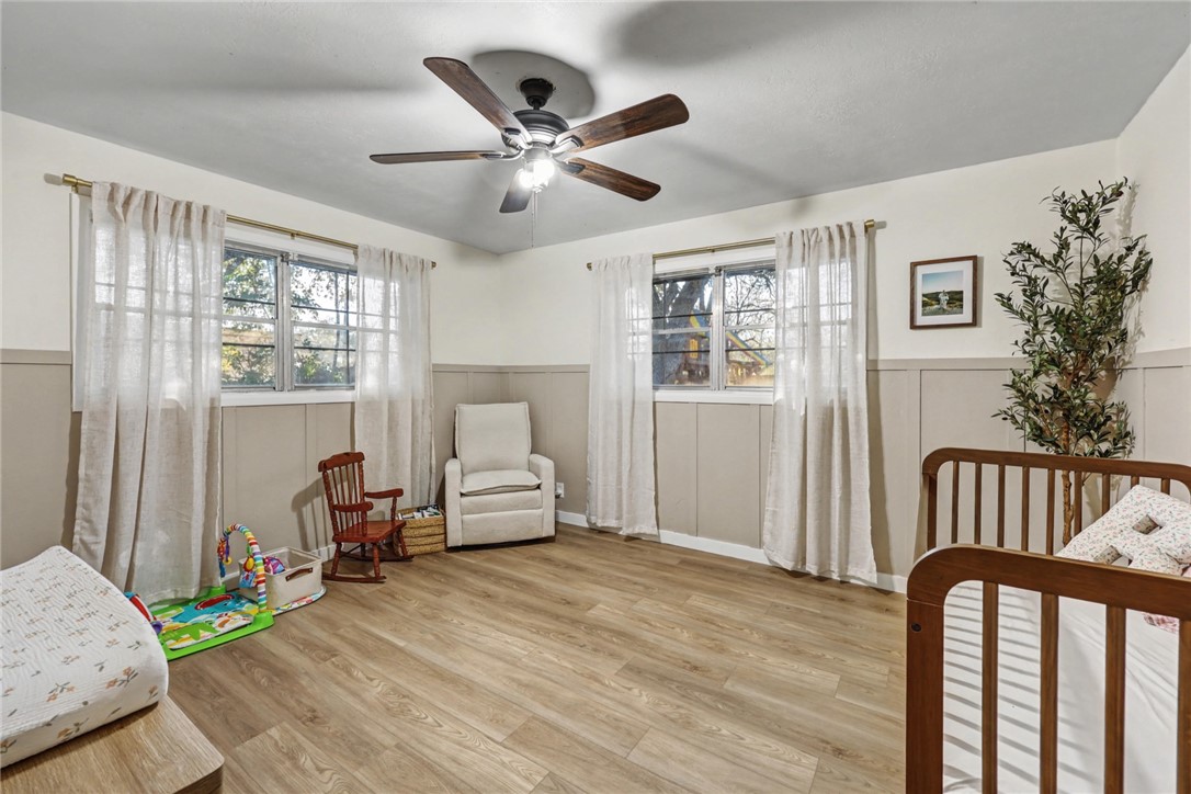 708 East Main Street Sinton, TX 78387 - Photo 20 of 28 a bedroom with furniture and windows