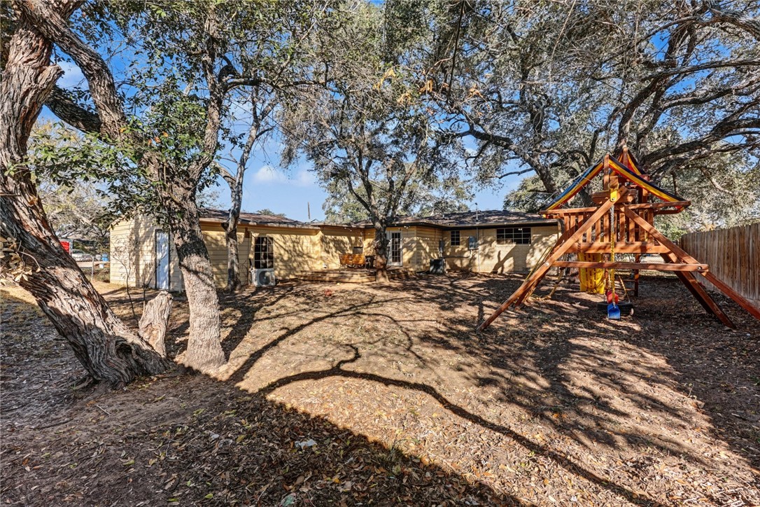 708 East Main Street Sinton, TX 78387 - Photo 26 of 28 a view of a yard with a tree