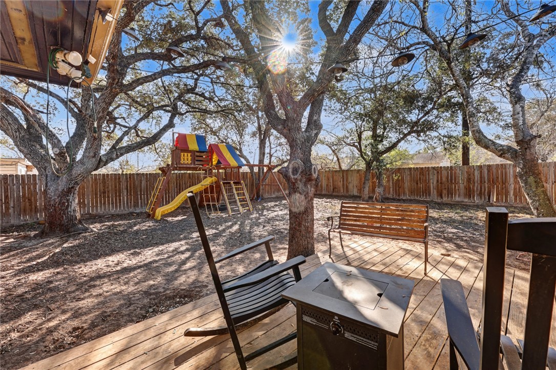 708 East Main Street Sinton, TX 78387 - Photo 28 of 28 a view of a backyard with a tree