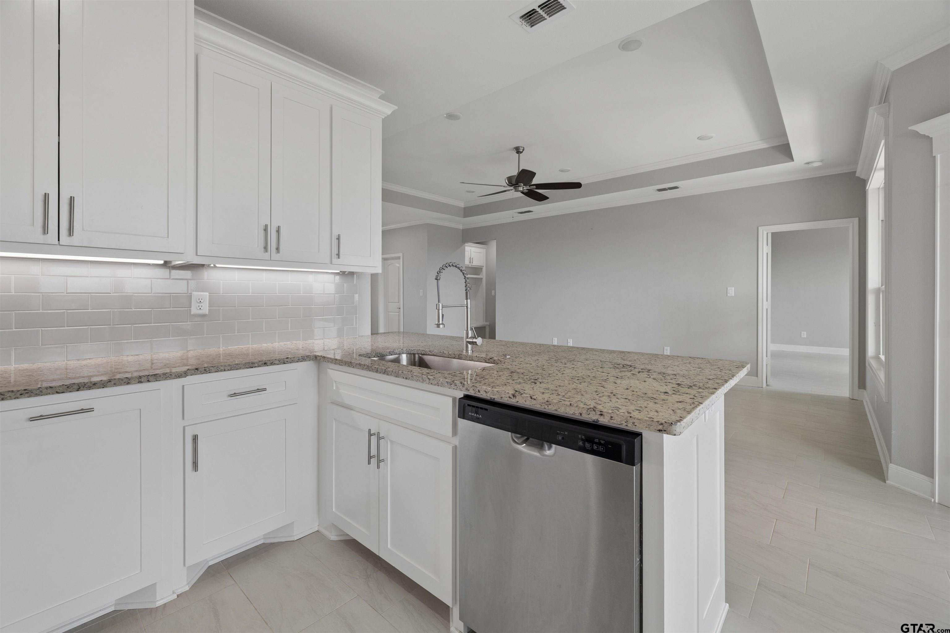 629 Third Street Bullard, TX 75757 - Photo 5 of 18 a kitchen with a sink and cabinets