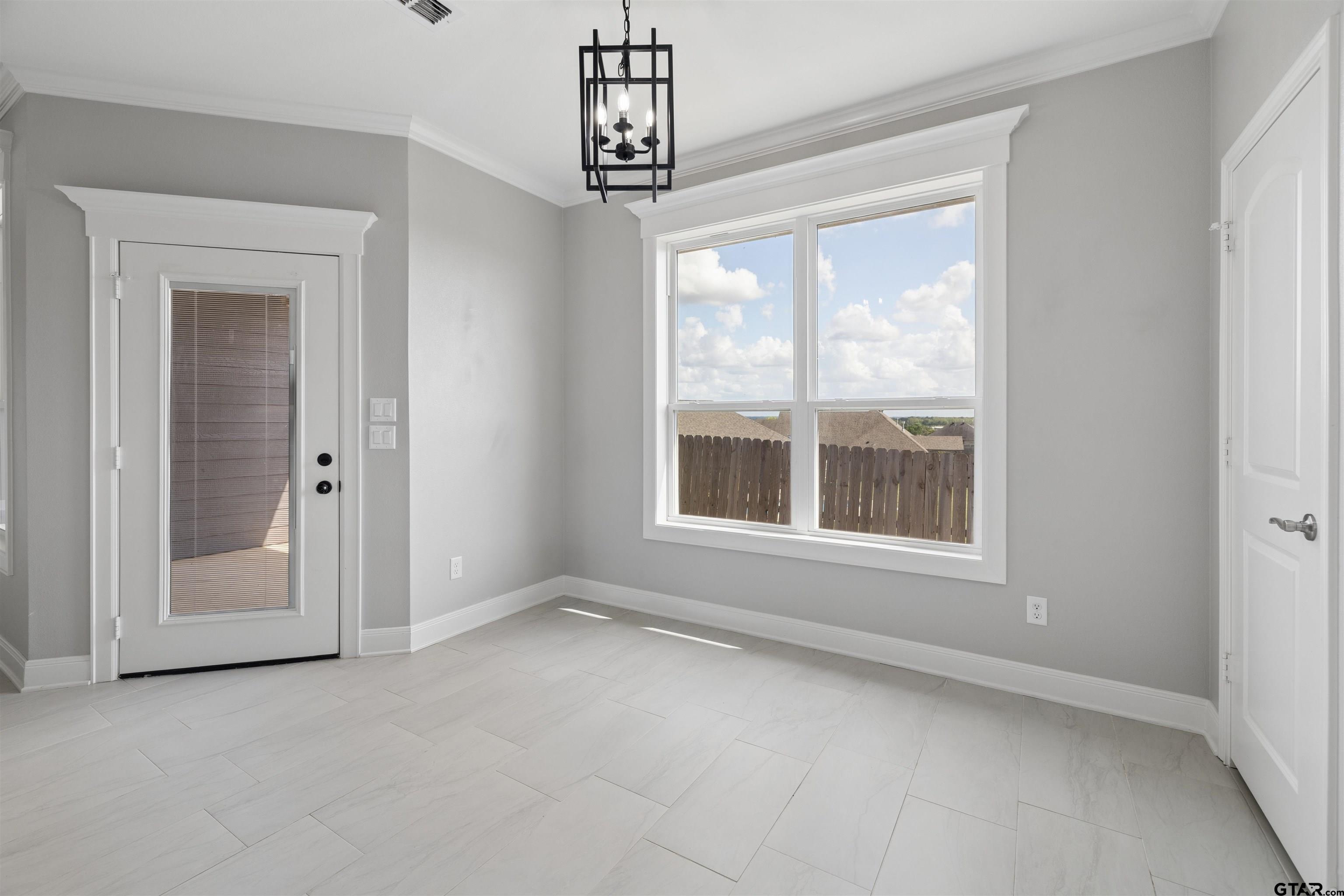 629 Third Street Bullard, TX 75757 - Photo 6 of 18 a view of an empty room with a window