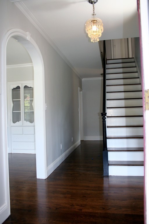 a view of entryway with wooden floor
