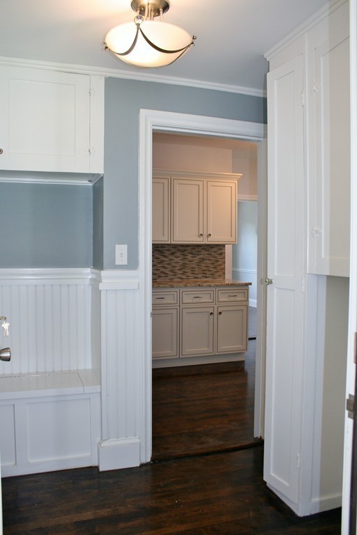 19 Dellwood Road Worcester, MA 01602 - Photo 20 of 26 a kitchen with white cabinets and sink
