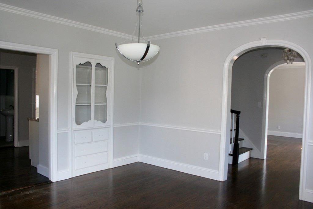 19 Dellwood Road Worcester, MA 01602 - Photo 4 of 26 a view of empty room with wooden floor and fan
