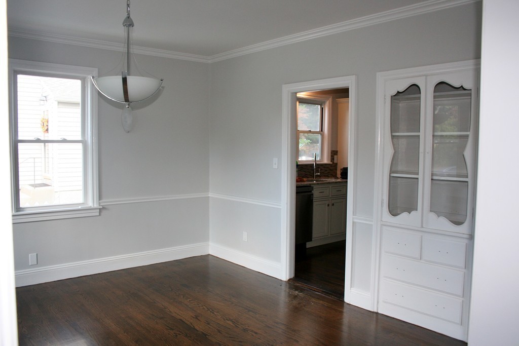 19 Dellwood Road Worcester, MA 01602 - Photo 7 of 26 a view of empty room with wooden floor and fan