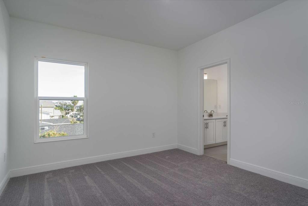 318 Rafael Boulevard Northeast St. Petersburg, FL 33704 - Photo 27 of 38 an empty room with windows