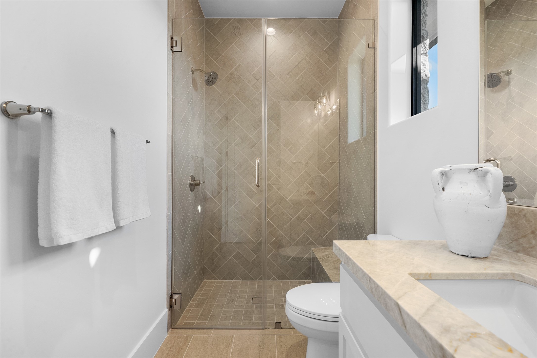 4961 Hartfield Road Round Top, TX 78954 - Photo 16 of 22 a bathroom with a sink toilet and shower