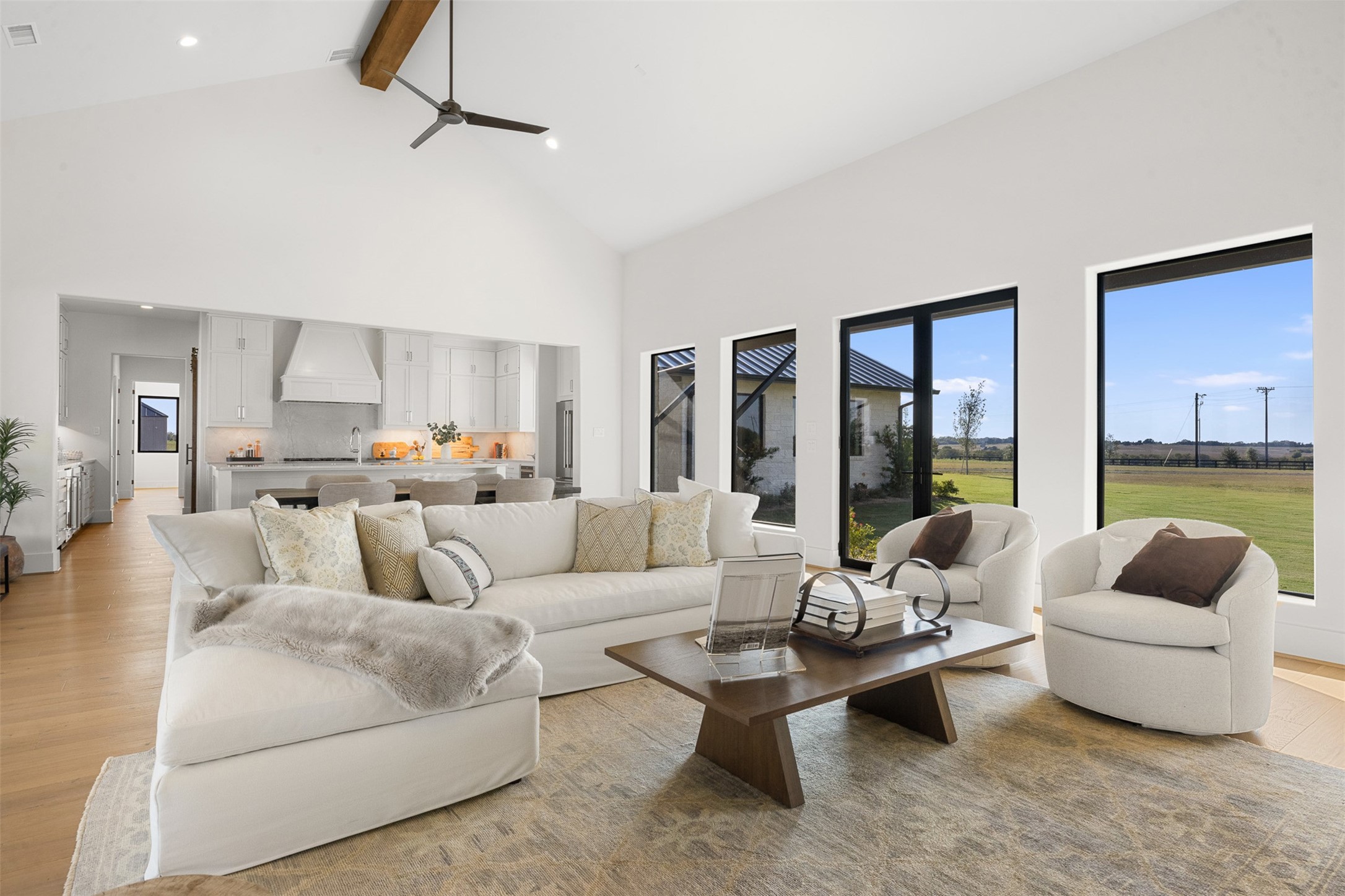 4961 Hartfield Road Round Top, TX 78954 - Photo 8 of 22 a living room with furniture and a large window
