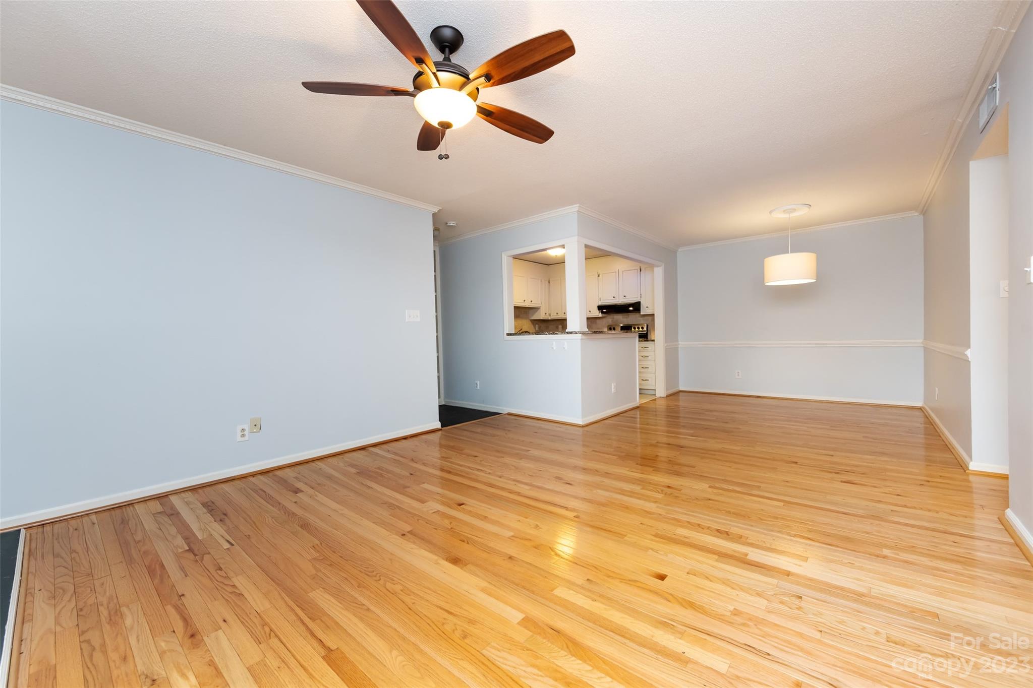 1336 Queens Road Charlotte, NC 28207 - Photo 11 of 36 a view of empty room with wooden floor