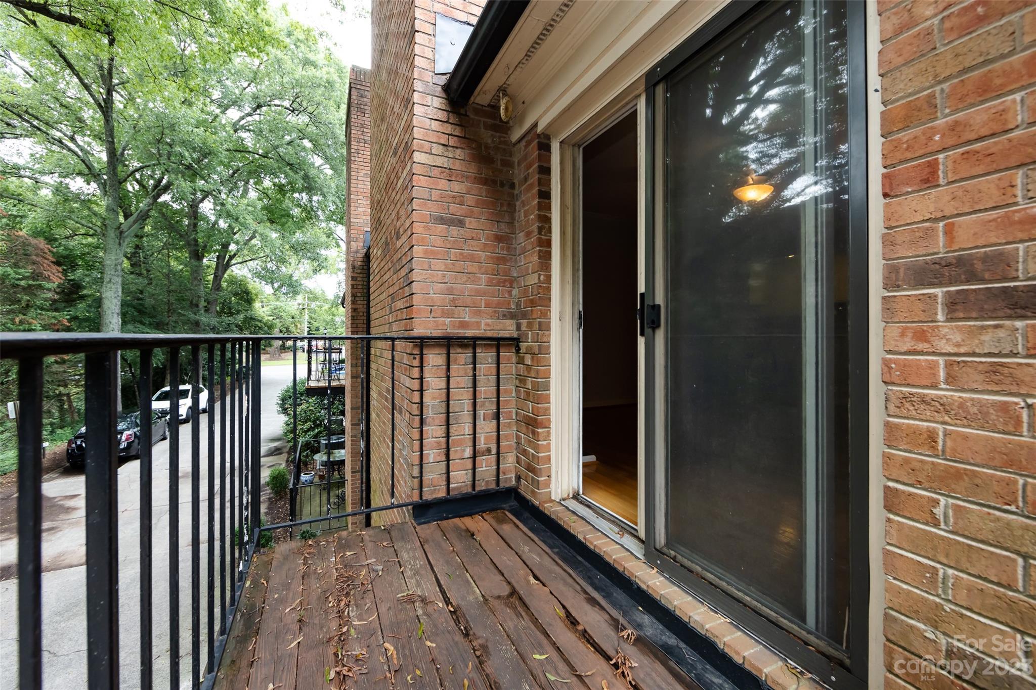 1336 Queens Road Charlotte, NC 28207 - Photo 15 of 36 a view of balcony with wooden floor