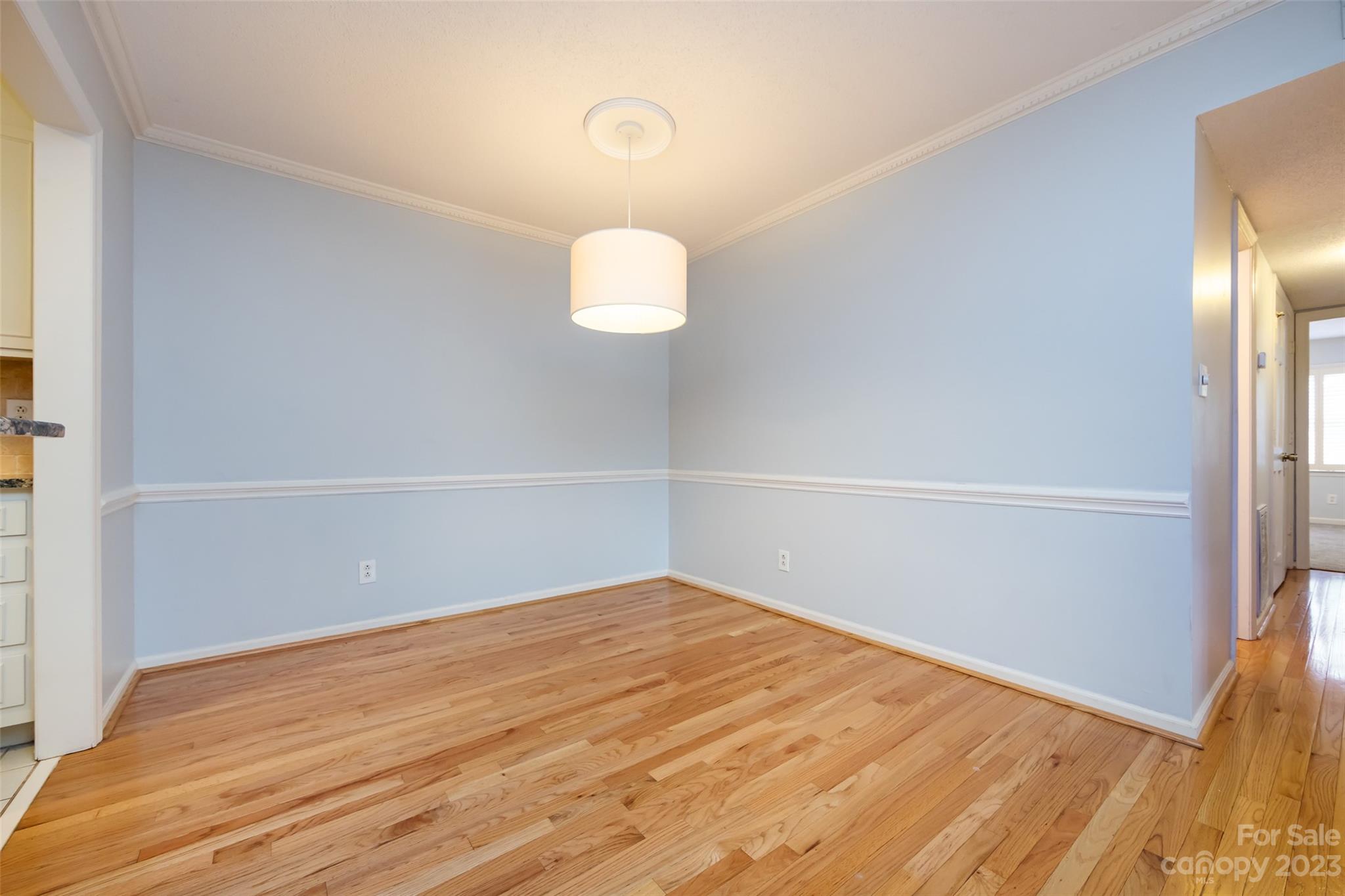 1336 Queens Road Charlotte, NC 28207 - Photo 18 of 36 a view of empty room with wooden floor