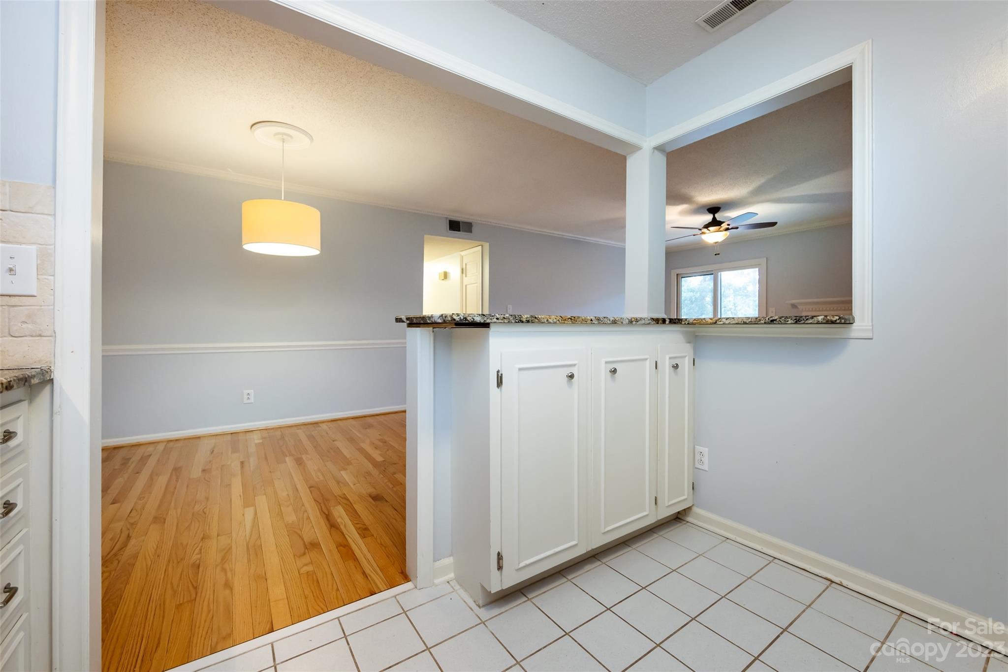 1336 Queens Road Charlotte, NC 28207 - Photo 23 of 36 a bathroom with a sink and a mirror