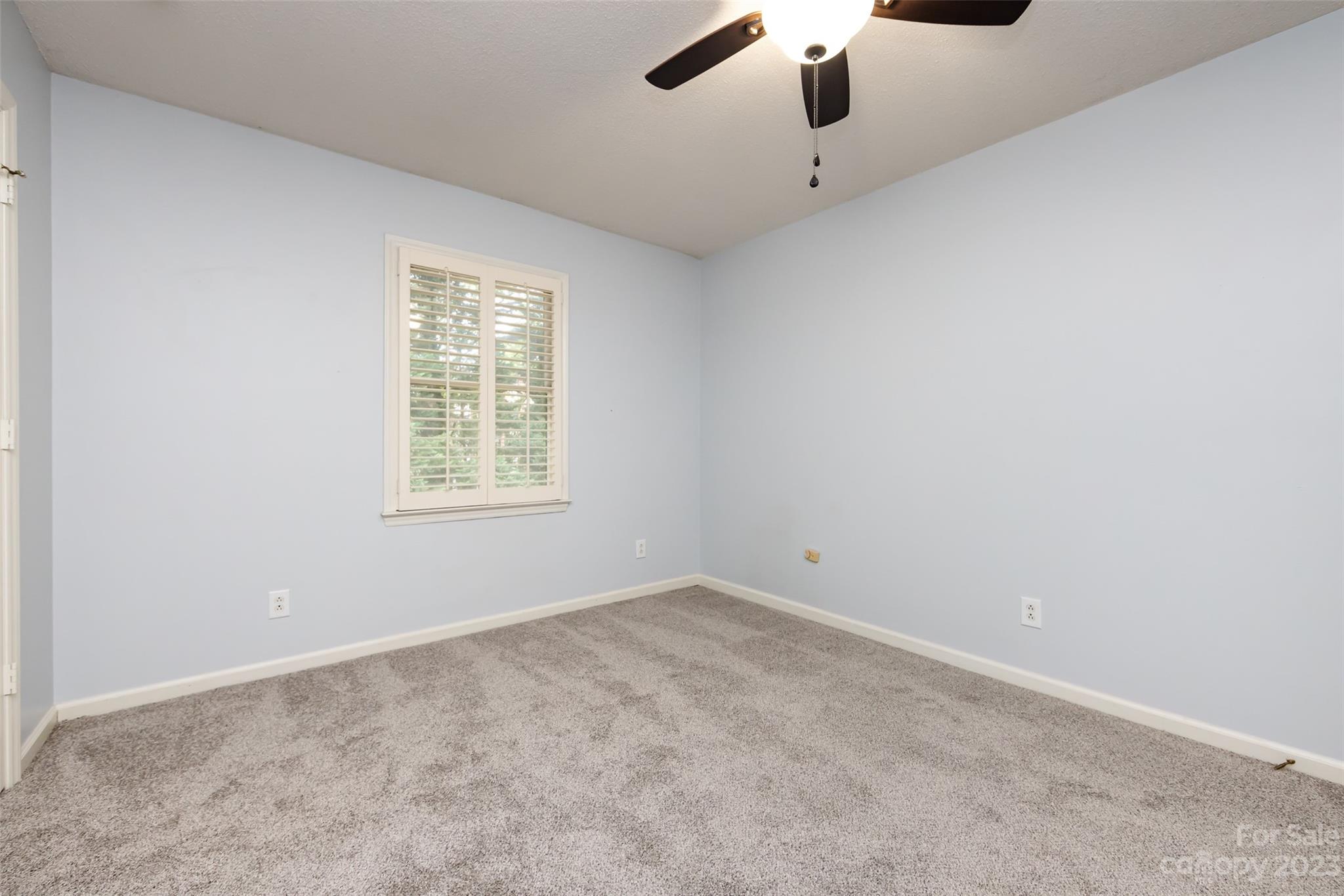 1336 Queens Road Charlotte, NC 28207 - Photo 31 of 36 an empty room with windows