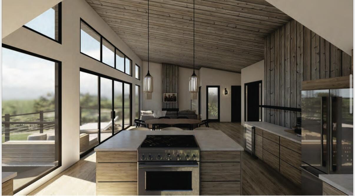 0 West End Road, Unit 1B Cuttyhunk, MA 02713 - Photo 14 of 20 a kitchen with stainless steel appliances granite countertop a stove and a refrigerator